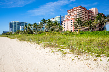Fototapeta na wymiar Scenic Miami Beach on a sunny day with condos and resort hotels.