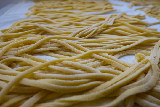 homemade spaghetti, also known as "torchi" or "troccoli"
