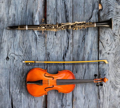 violin on an old wooden table