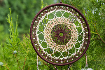 Handmade dream catcher with feathers threads and beads rope hanging