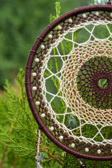 Handmade dream catcher with feathers threads and beads rope hanging