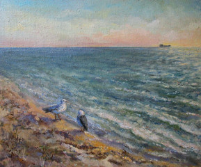 Sea after the storm foaming waves and seagulls on the coast.