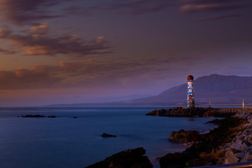 atardecer cerca de faro blanco, huasco, chile © Marco