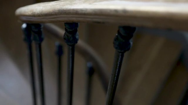 Handheld moving shot of parisian staircase with shallow depth of field