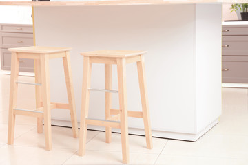 Modern counter with stools in kitchen