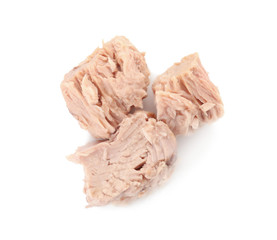Delicious canned tuna chunks on white background, top view