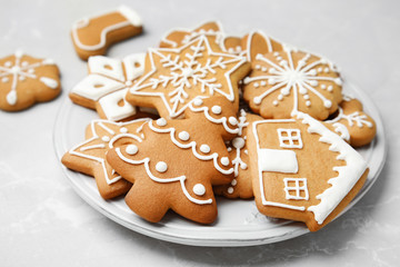 Fototapeta na wymiar Plate with tasty homemade Christmas cookies on table