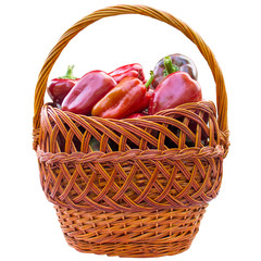 Basket with  Bulgarian red pepper isolated on a white background.