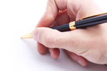 closeup .hand of a businessman signing the contract.