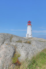Fototapeta na wymiar Vertical of Peggy's Cove Lighthouse, Nova Scotia, Canada