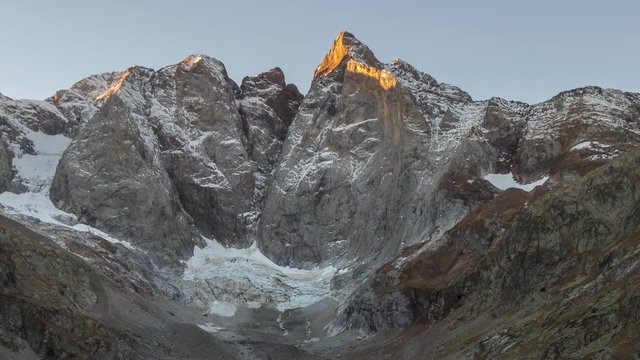 4k zoom view timelapse footage of a sunrise in the Vignemale peak mountain, in Pyrenees National Park, France.