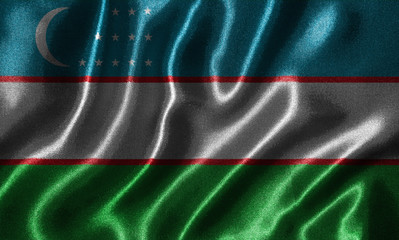 Wallpaper by Uzbekistan flag and waving flag by fabric.