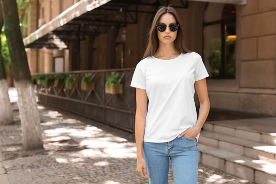 Young woman wearing white t-shirt on street