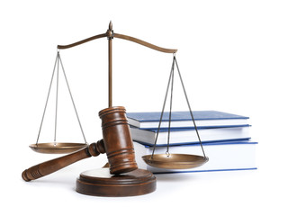 Wooden gavel, scales of justice and books on white background. Law concept