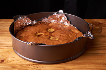 apricot pie baked in foil with ingredients cinnamon, abricot, eggs, flour, milk and sugar