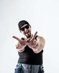Naklejka premium rapper headphones and dark glasses performs a rap song