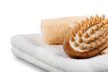 Fototapeta na wymiar Closeup of Towel, Sponge and Wooden Comb