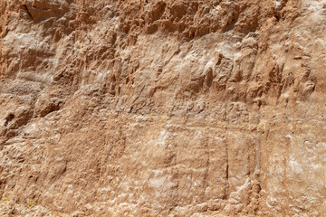 Cracked textured dry red soil in Eastern Kazakhstan