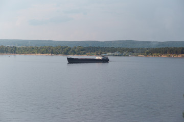 barge floating on the river