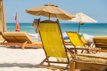 Relax on a chaise-longue. Armchair on the beach. 