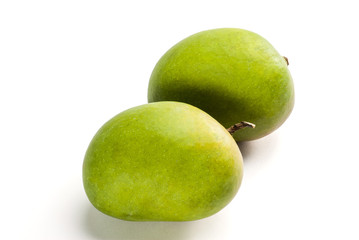 Raw Mangoes arranged on table top indoor