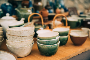 Ceramic Clay Crafts. Ceramic Dishware In Market. Bowls Of Different