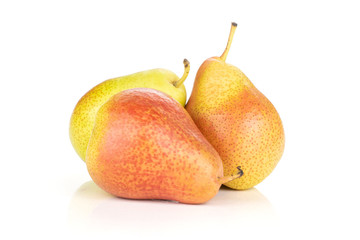 Group of three whole fresh red pear forelle variety stack isolated on white