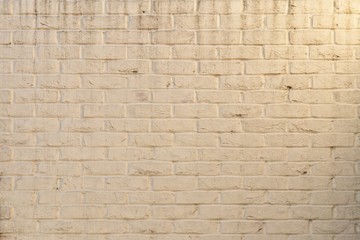 Whitewashed brick wall staind