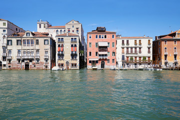 Fototapeta na wymiar Venice houses facades and the grand canal in a sunny day in Italy