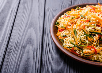 Asian noodles salad in bowl