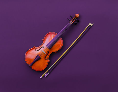 violin on red isolated background