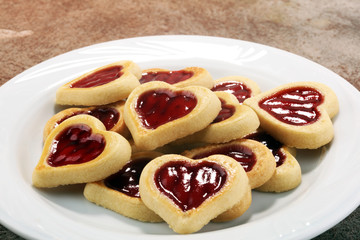 Heart shaped Valentines Day cookies with jam. Shaped biscuit cookie