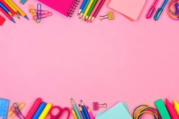 School supplies double border against a pastel pink paper background