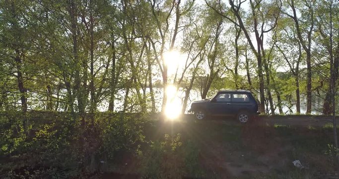 Car rides past the camera. Soviet and Russian SUV Lada Niva (VAZ 2121 / 21214) Moskow, Russia. 05-11-2018
