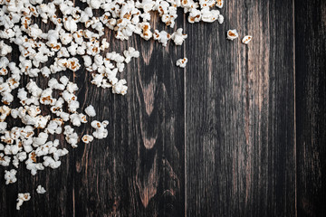 white popcorn on a vintage wooden background