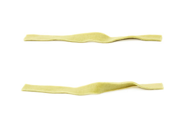 Single piece of fettucce pasta isolated