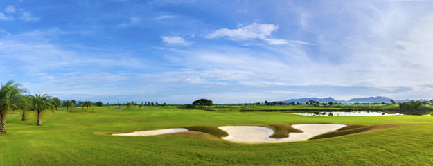 Panorama of Golf course with a rich green turf beautiful scenery.