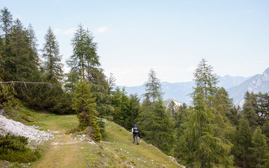 Fototapeta na wymiar Man walking in the Triglav national park, Slovenia