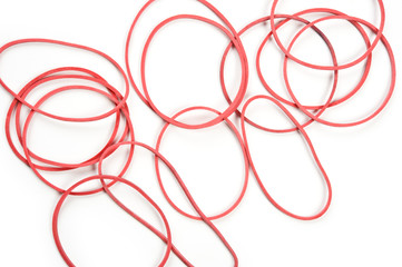Red rubber bands isolated on white background.