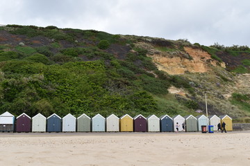View of Bournemouth beach huts from pier, England