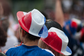 french supporter of football with the word france on tee shirt back during the giant screen projection of the final of the world cup france - croatia