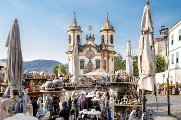 Tourist market in front of of the Saint Francis of Assisi church in Ouro Preto, Minas Gerais, Brazil