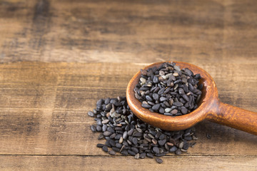 Black organic seeds of sesame - Sesamum indicum. Top view