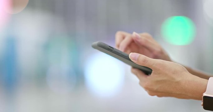 Close up of woman using mobile phone