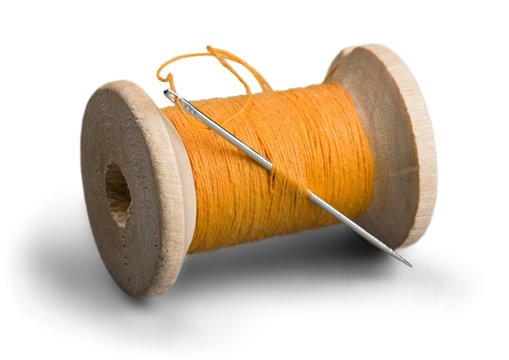 Spool Of Thread And Needle