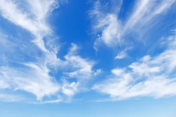 Poster Beautiful blue sky over the sea with translucent, white, Cirrus clouds © Aleksandr Simonov