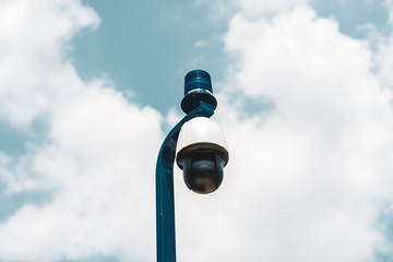 University Campus Emergency Security Camera Station With Blue Cloudy Sky