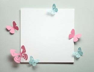 Paper butterfly on blank card
