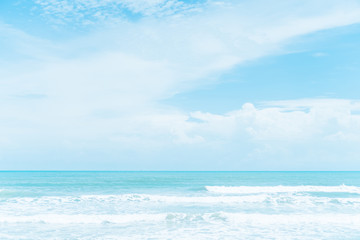 Naklejka na ściany i meble Summer blue beach and sand with blue sky background.