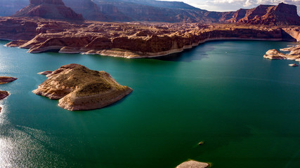 Aerial view of Lake Powell near Navjo Mountain, San Juan River in Glen Canyon with colorful buttes,...